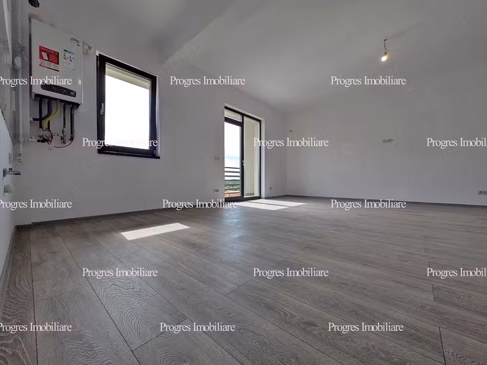 Ap.2 camere- Etaj 2- 53 mp+balcon 8 mp-Bloc nou finalizat-La asfalt-1 loc parcare inclus-94.500 euro