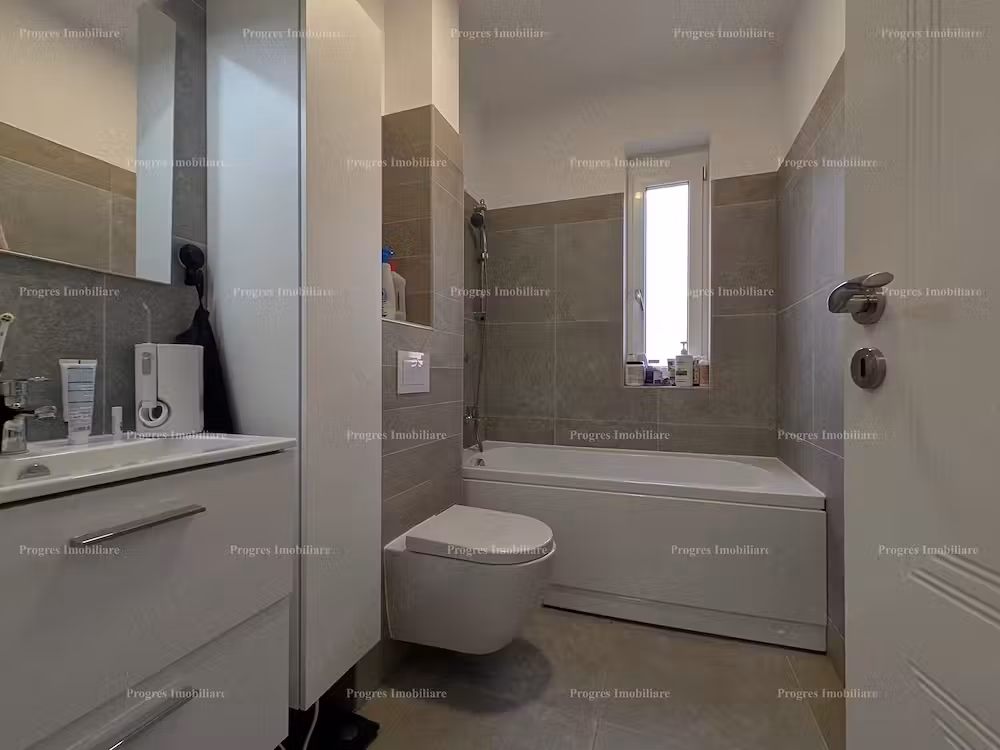 Ap.2 camere - mobilat si utilat - bloc nou - etaj 1 - parcare inclusa