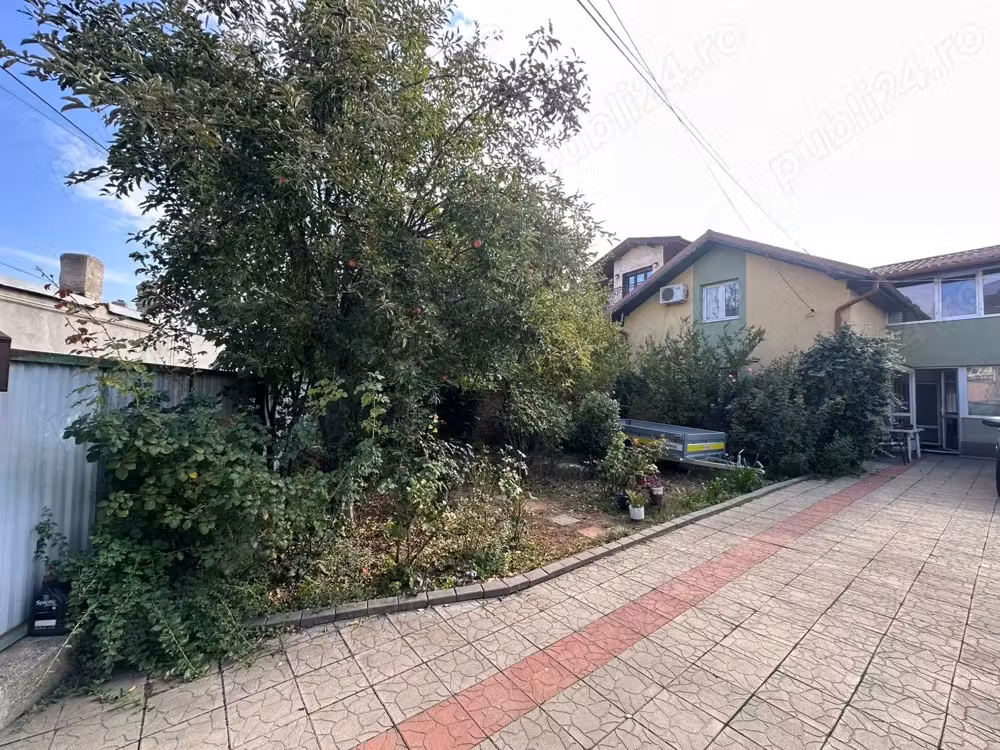 Casa individuala cu spatiu comercial in centru Popesti Leordeni