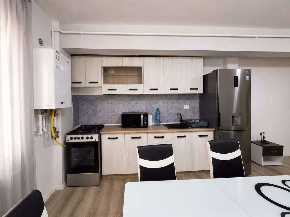 Vând apartament modern cu 2 camere, situat în Baciu, zona Regal