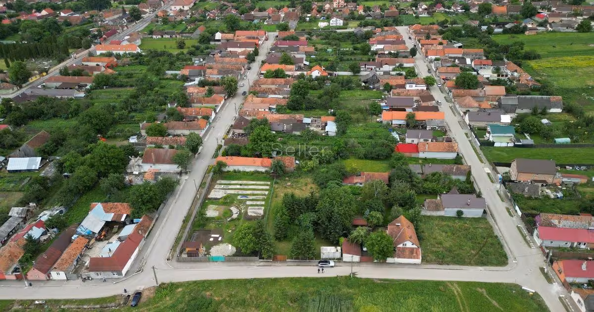 Teren Construcții intravilan de vânzare de 1125 mp, în Rotbav