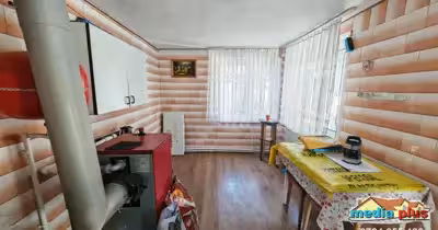 Casă Est